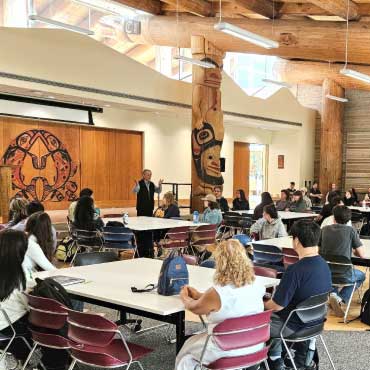 Students sitting in the Indigenous Student Orientation programming at UBC Vancouver.