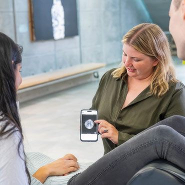 Dr. Shannon Kolind demonstrates the power and flexibility of portable MRI technology to UBC graduate students.