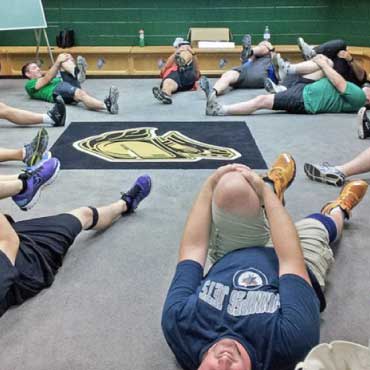 Participants take part in a Hockey FIT training session.