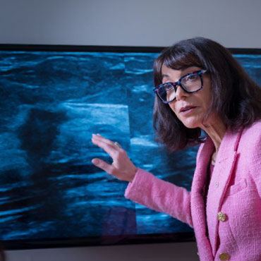 Dr. Paula Gordon speaks with a patient about the results of their screening ultrasound.